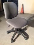 Used Desk chair with grey fabric and black trim 