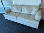Contemporary Off-White Leather Sofa with Tufted Cushions - ITEM #:165045 - Img 1 of 5
