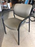 Stacking chairs with goldish colored fabric and black frame - ITEM #:175034 - Thumbnail image 1 of 3