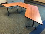 Used Trapeziodal folding tables with cherry laminate finish 