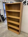 Used Oak laminate bookcase with solid back 