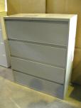 Used 4-drawer lateral file with grey finish 
