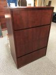 Used 4-drawer lateral file cabinet with mahogany veneer finish 