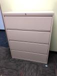 Used 4-drawer lateral file cabinet with light grey finish 