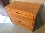 Used Used 2-drawer lateral file cabinet with oak veneer finish 