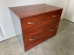 Used 2-drawer lateral file cabinet with cherry laminate grey frame 