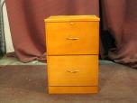 Used File cabinet with oak finish 