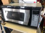 Used Sharp Carousel microwave with black door and stainless trim 