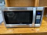 Used Oster 1100W Countertop Microwave Oven Stainless Steel - ITEM #:880054 - Img 1 of 5