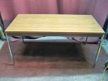 Used Table with medium oak laminate finish 