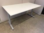 Used Table with white laminate top and silver frame - adjustable 