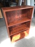Used Bookcase with cherry laminate finish - two adjustable shelves 