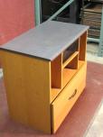 Used Lateral file with storage space and CD holder above 