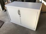 Used 1-drawer lateral file with shelf storage and sliding doors 